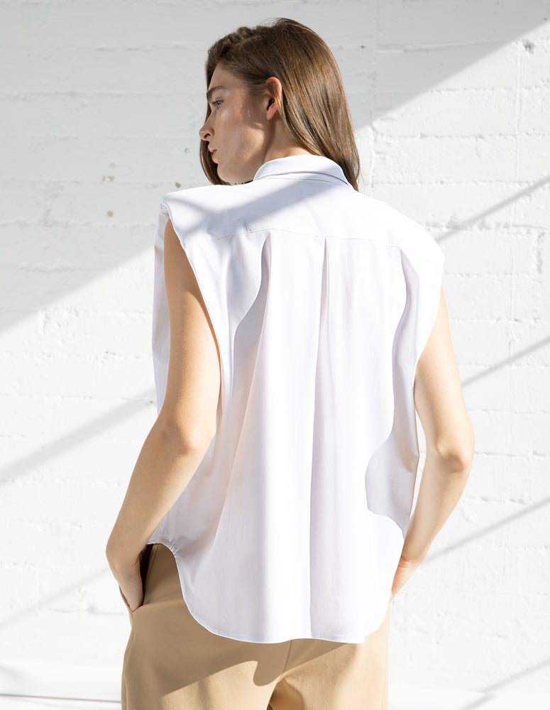 
                  
                    SLEEVELESS SHIRT IN WHITE
                  
                