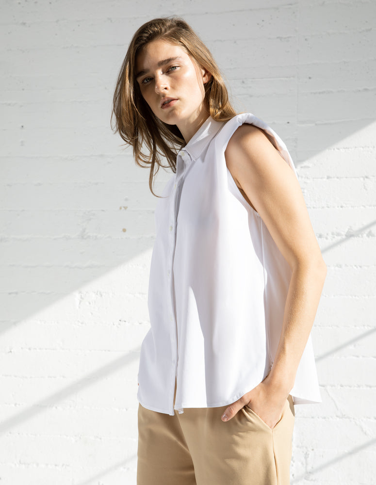 
                  
                    SLEEVELESS SHIRT IN WHITE
                  
                